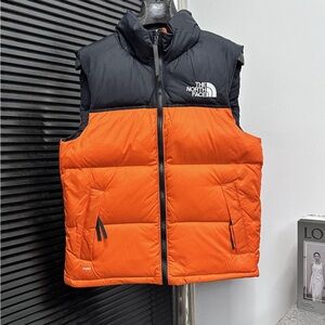 The North Face Men's Black and Orange Puffer Vest